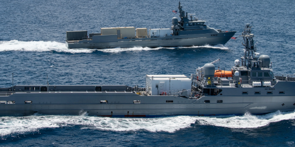 Unmanned surface vessel on open water during maritime operations